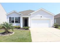 Charming single-story home with well-maintained landscaping and an attached two-car garage at 2681 Ophelia Way, Myrtle Beach, SC 29577