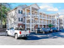 Attractive three-story condo building with ample parking at 1058 Sea Mountain Hwy. # 10-101, North Myrtle Beach, SC 29582