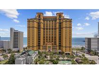 Stunning exterior view of a high-rise building, showcasing its architectural design and beachfront location at 2600 N Ocean Blvd. # 1914, Myrtle Beach, SC 29577