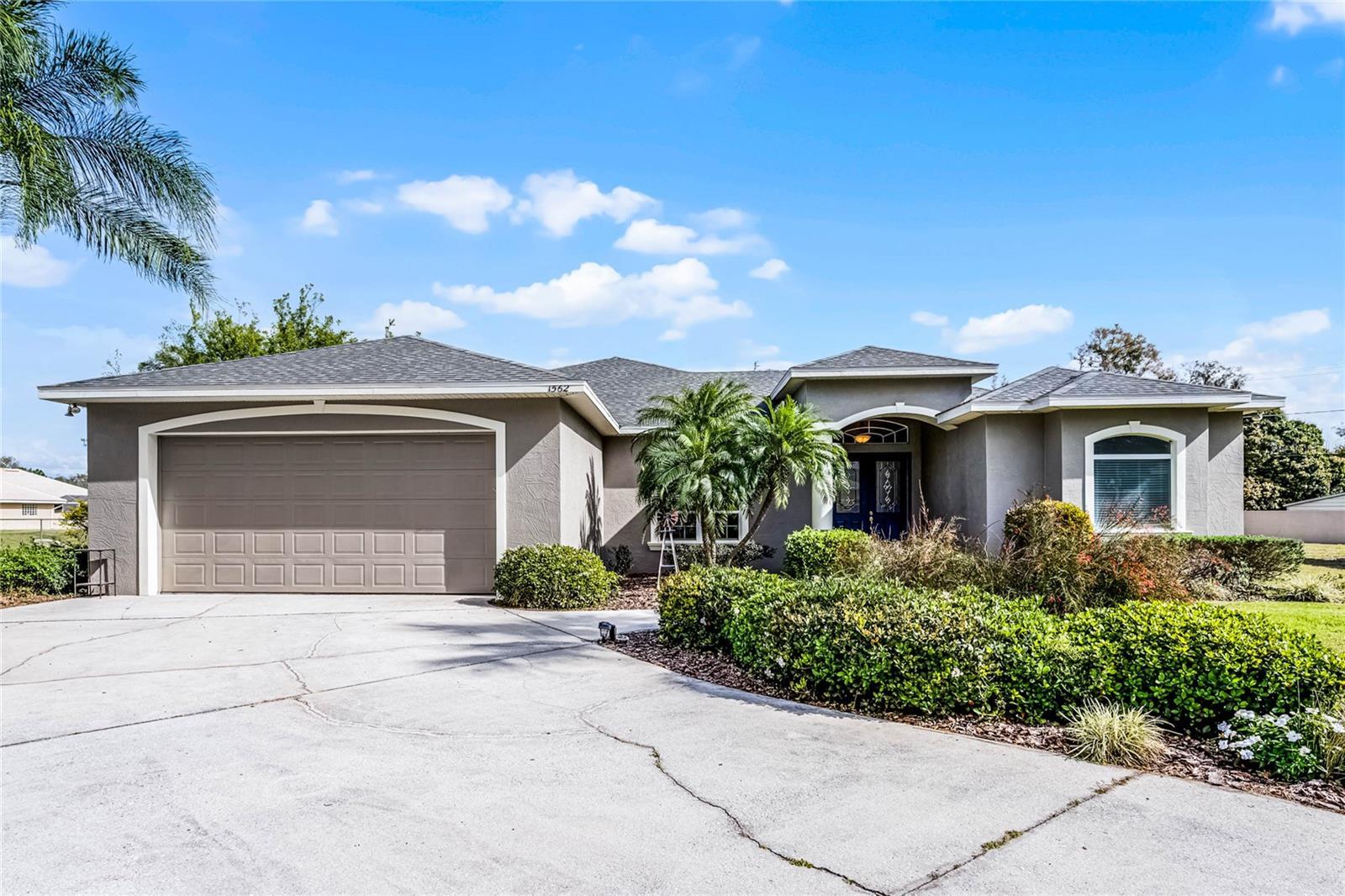 Photo one of 1562 Auburn Oaks Ct Auburndale FL 33823 | MLS O6285906