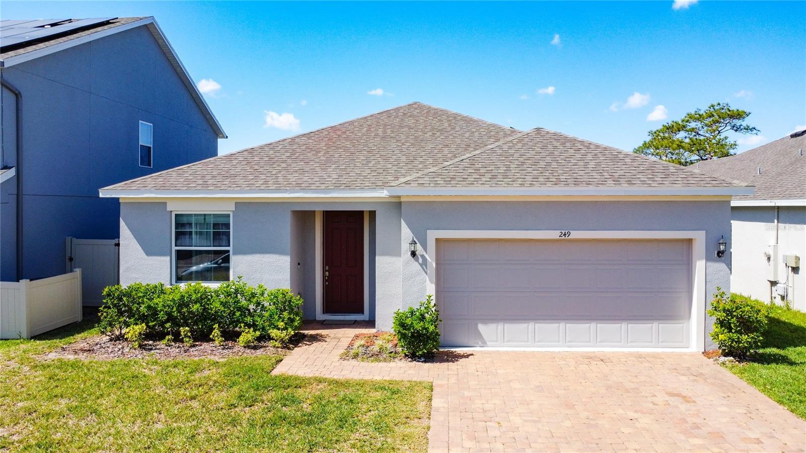 Photo one of 249 Hamlet Loop Davenport FL 33837 | MLS O6286454