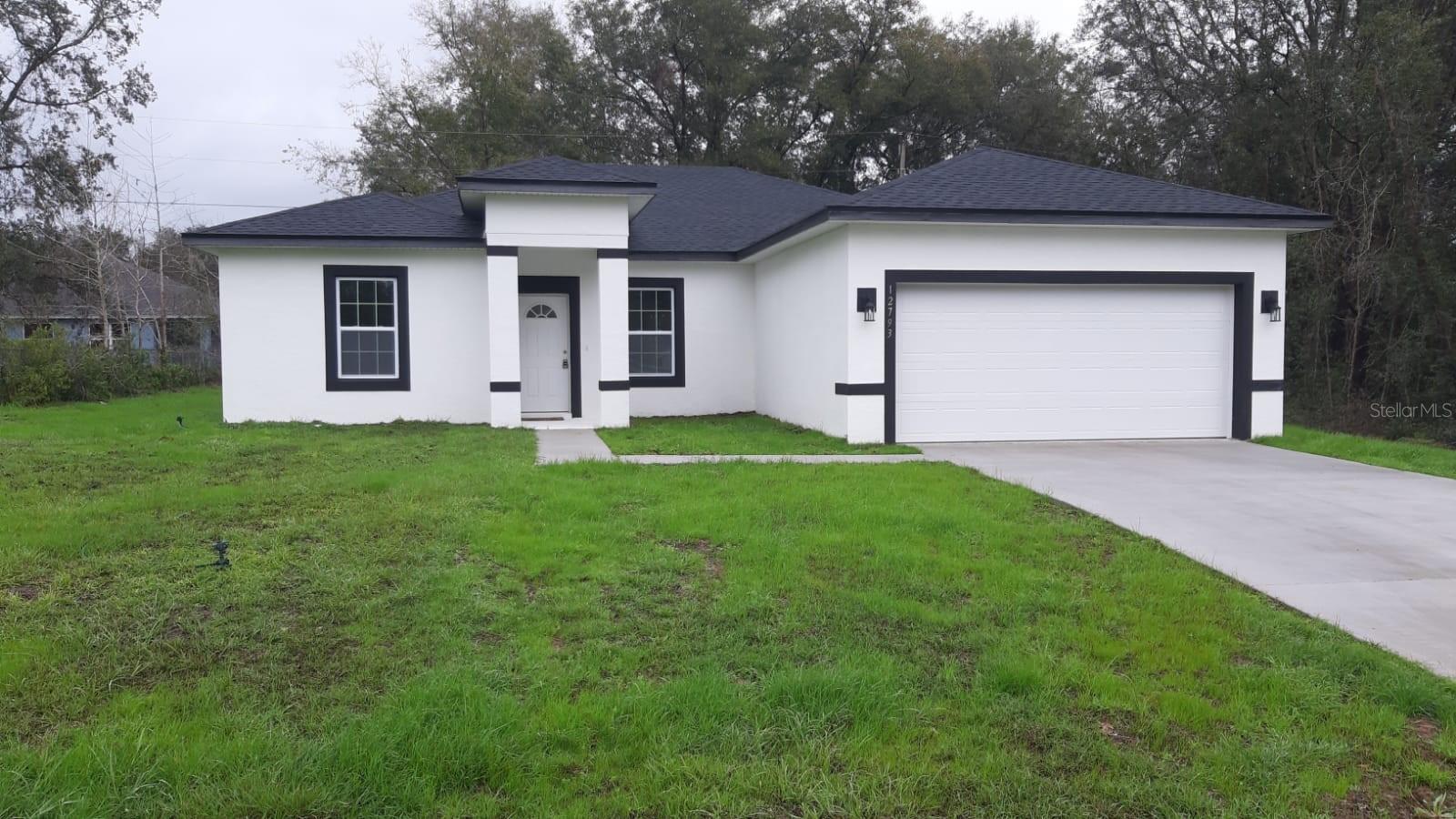 Photo one of 12793 Sw 43Rd Cir Ocala FL 34473 | MLS O6287794