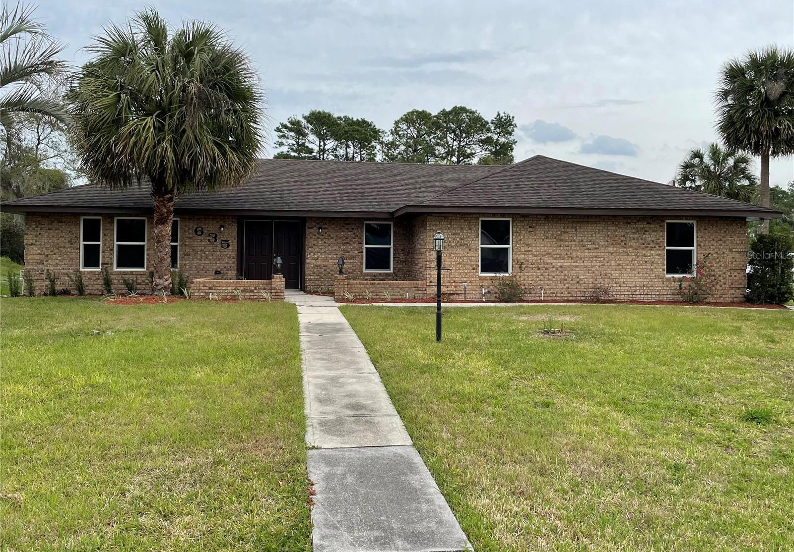 Photo one of 635 Malaga Ave Deltona FL 32725 | MLS O6290841