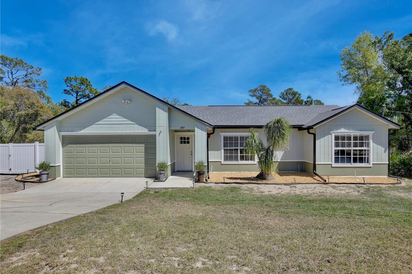 Photo one of 209 Roman Ct Deltona FL 32738 | MLS O6291152