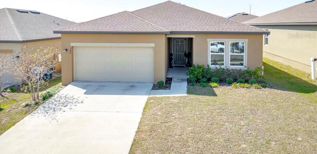 Photo one of 748 Orchid Grove Blvd Davenport FL 33837 | MLS S5121401