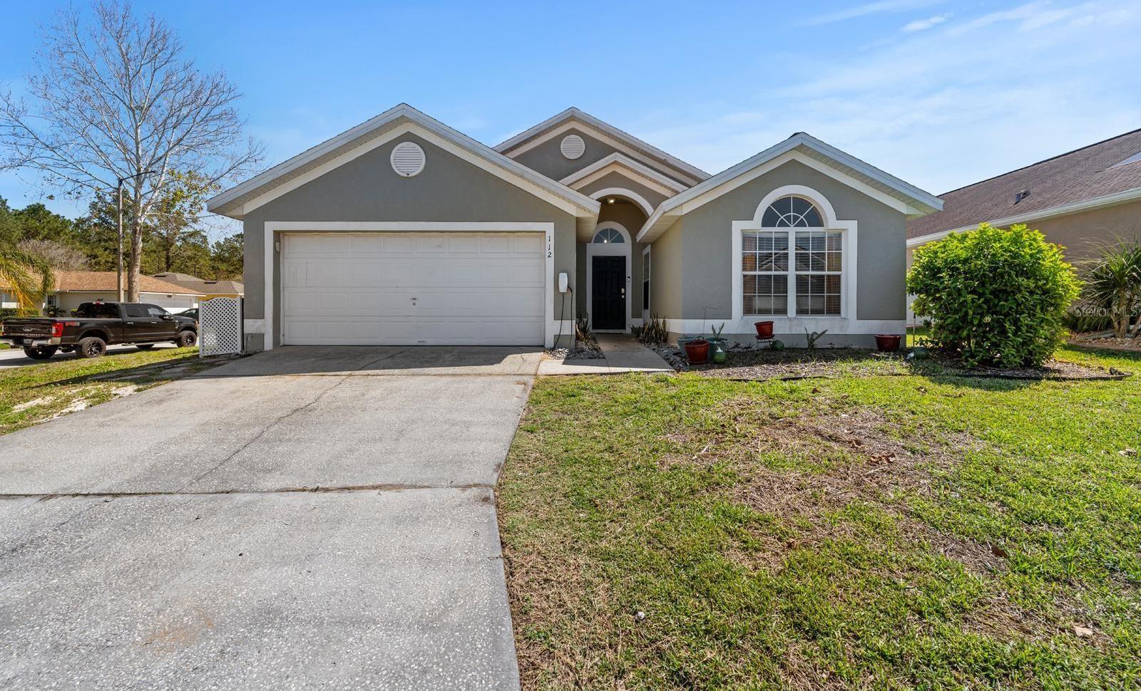 Photo one of 112 Thorne Meadow Pass Davenport FL 33897 | MLS TB8362172