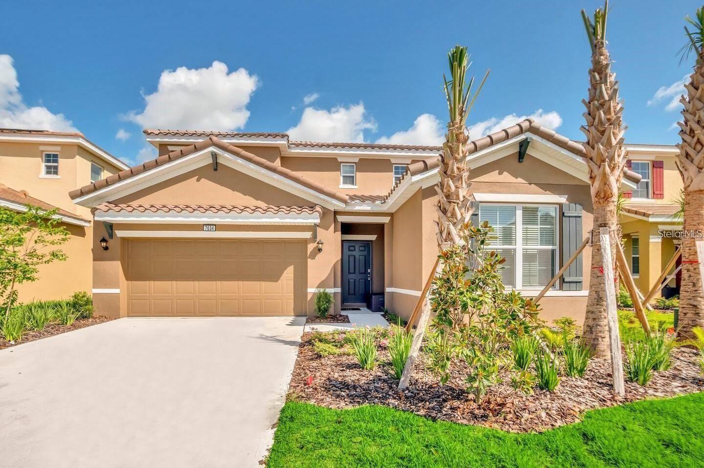 Photo one of 7634 Oakmoss Loop Davenport FL 33837 | MLS TB8383269