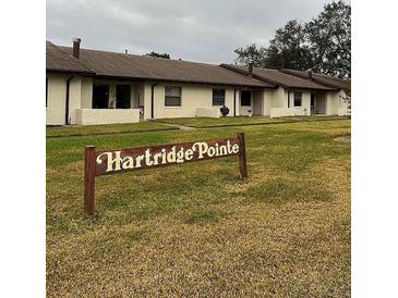 Hartridge Pointe community with well-maintained lawns at 2488 Hartridge Point W Dr # 2488, Winter Haven, FL 33881