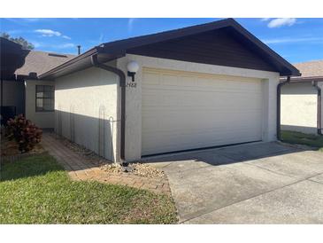 Attached garage with off-street parking at 2488 Hartridge Point W Dr # 2488, Winter Haven, FL 33881