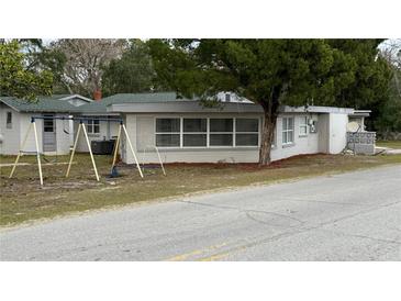 Newly renovated home with a spacious yard and charming curb appeal at 11331 Northern Ave, Leesburg, FL 34788