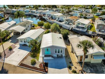 Waterfront manufactured homes feature boat docks and beautifully landscaped yards in a sunny coastal community at 9000 Us Highway 192 # 242, Clermont, FL 34714