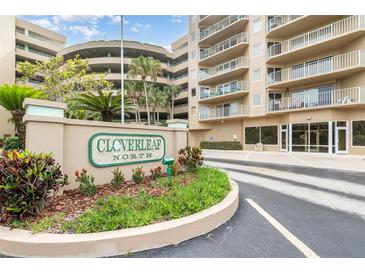 Attractive community signage and landscaping welcomes you to Cloverleaf North Condominiums at 4 Oceans West Blvd # 502B, Daytona Beach, FL 32118