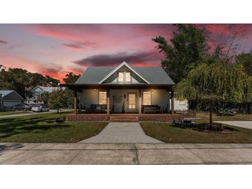 Charming single-Gathering home with a welcoming front porch, perfect for relaxing evenings at 520 E Stanford St, Bartow, FL 33830