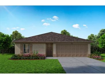 Charming single-story home featuring a well-manicured lawn, a two-car garage, and inviting curb appeal at 367 Bowfin Ct, Poinciana, FL 34759