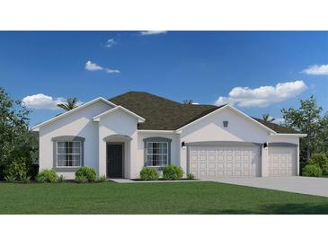Charming single-story home featuring a three-car garage, stucco walls, and well-manicured lawn against a bright blue sky at 5069 Sw 116Th Pl, Ocala, FL 34476
