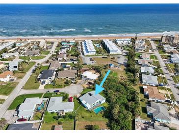 Aerial view of a single-Gathering home near the beach with a pool at 6 Baytree Cir, Ormond Beach, FL 32176