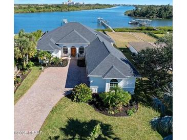 Luxury waterfront home with private dock and stunning water views at 59 Cunningham Dr, New Smyrna Beach, FL 32168