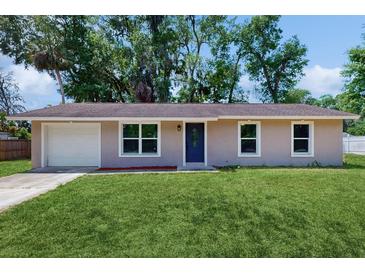 Charming single-story home with a well-maintained lawn and inviting curb appeal at 330 Ponce Deleon Blvd, De Leon Springs, FL 32130