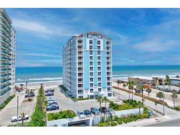 Beautiful blue and white condo building with ocean views, close to beach access and garage parking at 2071 S Atlantic Ave # 1005, Daytona Beach Shores, FL 32118