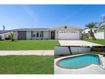 Charming single-story home with well-manicured lawn, two car garage, and inviting backyard pool at 105 Bonita Pl, Ormond Beach, FL 32174