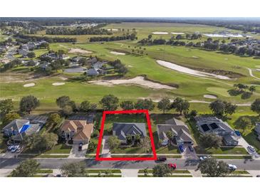 Aerial view of single-Gathering home on golf course community at 23436 Valderama Ln, Sorrento, FL 32776