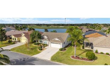 Attractive single-story home with a two-car garage, situated on a golf course at 1149 Eureka Mill Run, The Villages, FL 32162