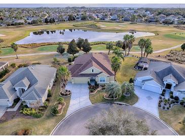 Luxury home on golf course with pool and fountain at 2010 Allure Loop, The Villages, FL 32162