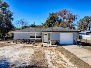 Newly renovated home with stone accents and a spacious yard at 2156 Cr 437A, Lake Panasoffkee, FL 33538