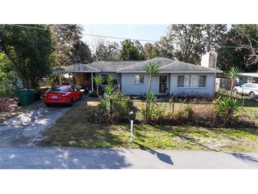 Charming single-story home featuring mature landscaping and inviting curb appeal at 1202 Deidrich Ct, Eustis, FL 32726