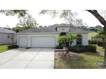 Charming single-Gathering home with a well-maintained lawn and a two-car garage at 2185 Caxton Ave, Clermont, FL 34711