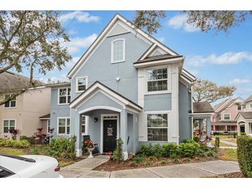Charming two-story townhome with landscaped yard and covered entry in a desirable neighborhood at 3368 Parkchester Square Blvd # 104, Orlando, FL 32835