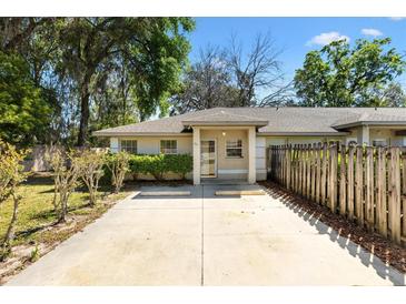 Charming home exterior featuring a well manicured lawn and extended driveway at 11191 Se 55Th Avenue Rd # 401, Belleview, FL 34420