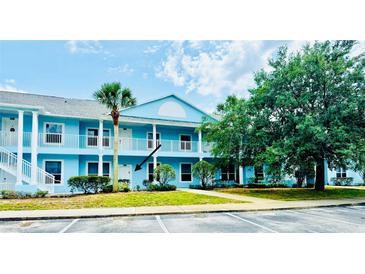 Charming two-story condo with private balconies and beautiful landscaping at 3107 Sun Lake Ct # A, Kissimmee, FL 34747