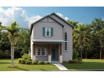 Charming two-story home with light gray facade, aqua trim, and a welcoming front porch at 1065 Peebles St, Orlando, FL 32827