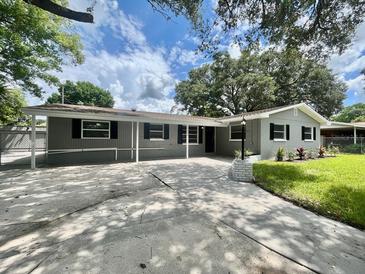 Charming single-story home with a well-manicured front yard and a spacious driveway at 3523 Colleen Dr, Lakeland, FL 33810