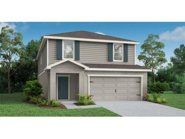 Two-story home with a two-car garage, neutral siding, blue shutters, and a covered entryway at 5105 Sylas Jax Ave, Winter Haven, FL 33884