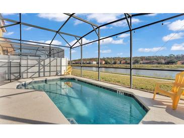 Enjoy the beautiful backyard pool, screened in, with lovely lake views at 531 Las Fuentes Dr, Kissimmee, FL 34746