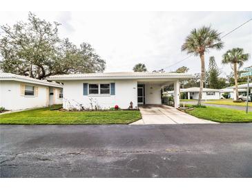Front view of a single story home with carport at 726 Erie Ct, Lakeland, FL 33803
