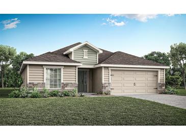 One-story home with a neutral color palette and landscaping at 1148 Aruba Ave, Mulberry, FL 33860