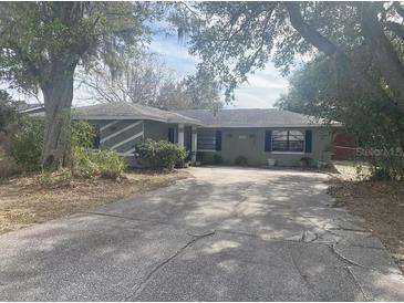 House exterior showing front yard, driveway, and landscaping at 3638 W Wheeler Rd, Lakeland, FL 33810