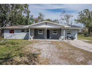 Charming single-story home with a covered front entrance and freshly painted exterior at 808 Spirit Lake Rd, Winter Haven, FL 33880