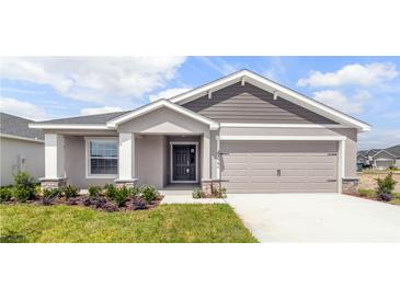 Charming single-story home with well-maintained lawn and a welcoming two-car garage at 4522 Rapallo Ave, Winter Haven, FL 33884