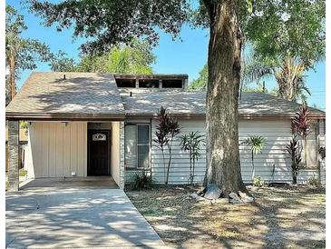 Charming single-story home with a well-maintained front yard and mature trees at 4641 Devon Ave, Lakeland, FL 33813