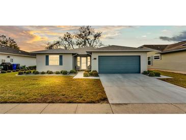 Charming single-story home with a well-manicured lawn and inviting curb appeal at 3717 Highland Fairways Blvd, Lakeland, FL 33810