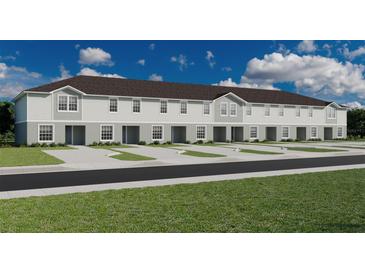 New two-story townhomes boast classic architectural details and private parking spaces for each unit at 317 Wharf Way, Winter Haven, FL 33881