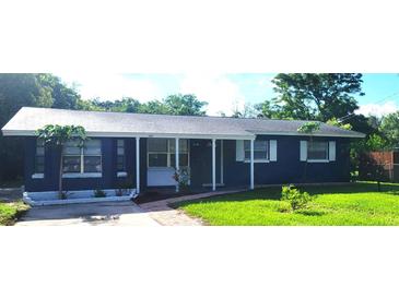 Charming one story home featuring a front yard and updated landscaping at 1024 31St Nw St, Winter Haven, FL 33881