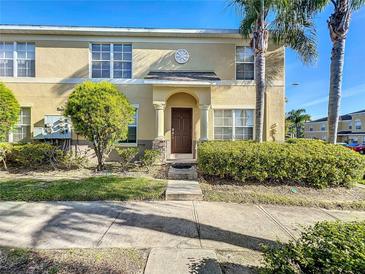 Inviting two-story townhome with well-maintained landscaping at 5458 Quarry Rock Rd, Lakeland, FL 33809