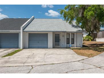 Charming single-story home with a one-car garage and well-maintained front yard at 6315 Conductor Ct, Lakeland, FL 33813