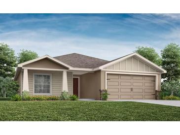 Charming single-story home with a two-car garage, well-maintained lawn, and inviting front entrance at 1809 Noble Dr, Davenport, FL 33837