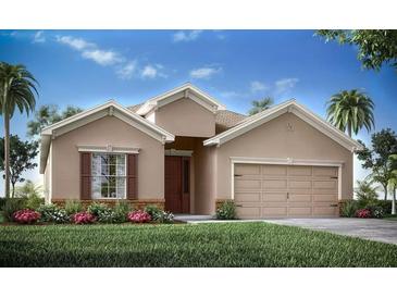 Charming single-story home featuring a 2-car garage, well-manicured lawn, and beautiful landscaping at 1833 Noble Dr, Davenport, FL 33837